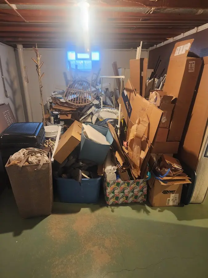 Roll-off dumpster container at job site for 2 Yard Dumpster Rental in Clay Center